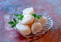 Raw sea scallops on a shell plate Royalty Free Stock Photo