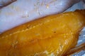 Raw seasoned fish fillets on baking tray closeup Royalty Free Stock Photo
