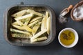 Raw Seasoned French Fries in Baking Tray