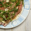 Raw Shoulder of Lamb Meat in Olive Oil Marinade on Plate With Bl Royalty Free Stock Photo