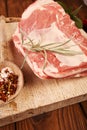 raw shoulder lamb on wooden board Royalty Free Stock Photo