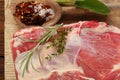 Raw shoulder lamb on wooden board and table Royalty Free Stock Photo