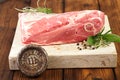 Raw shoulder lamb on wooden board and table Royalty Free Stock Photo