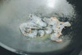 Raw shrimp in a hot frying pan Royalty Free Stock Photo