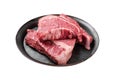 Raw Silverside sirloin beef steak cut on butcher tray. Isolated on white background. Top view.