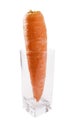 Raw single Carrot in glass isolated Royalty Free Stock Photo