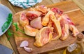 Raw sliced chicken on wooden cutting board Royalty Free Stock Photo