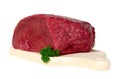 Raw sliced meat on cutting board