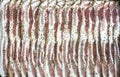 Raw sliced peppercorn bacon