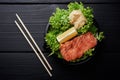 Raw Sliced Salmon Fillet on Black Stone Background. Thick Pieces of Fresh Trout. Red Fish Sashimi
