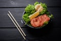 Raw Sliced Salmon Fillet on Black Stone Background. Thick Pieces of Fresh Trout. Red Fish Sashimi