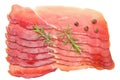 Raw smoked black forest ham with rosemary and peppercorns isolated on white background. top view Royalty Free Stock Photo