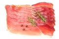 Raw smoked black forest ham with rosemary and peppercorns isolated on white background. top view Royalty Free Stock Photo