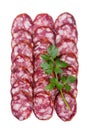 Raw smoked sausage cut into pieces, laid out in rows with parsley Royalty Free Stock Photo