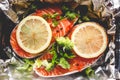 Raw sockeye salmon steaks on foil before baking in oven. Royalty Free Stock Photo