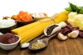 Raw spaghetti Ingredients on wooden table Royalty Free Stock Photo