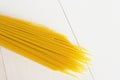Raw spaghetti on a white background isolated