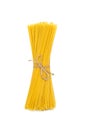 Raw spaghetti tied with a rope on a white isolated background