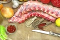 Raw Spare Ribs On Wood Cutting Board With Spices Royalty Free Stock Photo