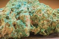 Raw specimen of Malachite stone from mining and quarrying industries. Malachite is a copper carbonate hydroxide mineral, with Royalty Free Stock Photo