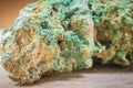 Raw specimen of Malachite stone from mining and quarrying industries. Malachite is a copper carbonate hydroxide mineral, with Royalty Free Stock Photo