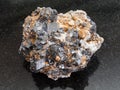 Raw Sphalerite with Galena stone on dark