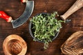 Raw sprig of marjoram, spice on old table