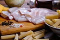 Raw squid composition on a wooden background