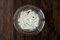 Raw Calamari Squid Rings in Water with Glass Bowl. Royalty Free Stock Photo