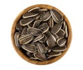 Raw sunflower seeds in bowl isolated on white. Top view Royalty Free Stock Photo