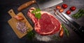 Raw T Bone steak entrecote prepared to Grill on turntable Royalty Free Stock Photo