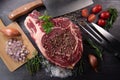 Raw T Bone steak entrecote prepared to Grill on turntable Royalty Free Stock Photo