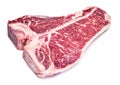 Raw T-bone steak on the white. Royalty Free Stock Photo