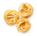 Raw Tagliatelle Pasta Nests Isolated On White Background Royalty Free Stock Photo