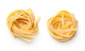 Raw Tagliatelle Pasta Nests Isolated On White Background Royalty Free Stock Photo