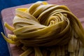 Raw Tagliatelle / Uncooked Pasta or Spaghetti. Royalty Free Stock Photo