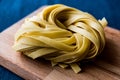 Raw Tagliatelle / Uncooked Pasta or Spaghetti. Royalty Free Stock Photo