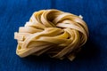 Raw Tagliatelle / Uncooked Pasta or Spaghetti. Royalty Free Stock Photo