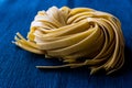 Raw Tagliatelle / Uncooked Pasta or Spaghetti. Royalty Free Stock Photo