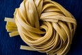 Raw Tagliatelle / Uncooked Pasta or Spaghetti. Royalty Free Stock Photo