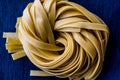 Raw Tagliatelle / Uncooked Pasta or Spaghetti. Royalty Free Stock Photo