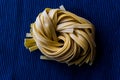 Raw Tagliatelle / Uncooked Pasta or Spaghetti. Royalty Free Stock Photo