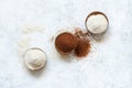 Raw teff grain and teff flour in a wooden bowls