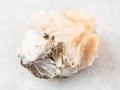 raw Thomsonite stone on white marble Royalty Free Stock Photo