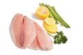 Raw tilapia with asparagus and lemon Royalty Free Stock Photo