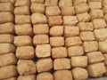 Raw tofu brown , home made industrial, traditional Indonesian food. Royalty Free Stock Photo