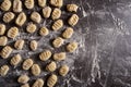 Raw traditional Italian gnocchi dish on a table with flour Royalty Free Stock Photo