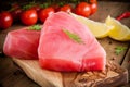 Raw tuna fillet with dill, lemon and cherry tomatoes