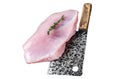 Raw turkey breast fillet on a wooden butcher board with meat cleaver. Isolated, white background. Royalty Free Stock Photo