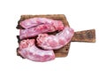 Raw Turkey neck meat on a butcher wooden board. Isolated, white background. Royalty Free Stock Photo